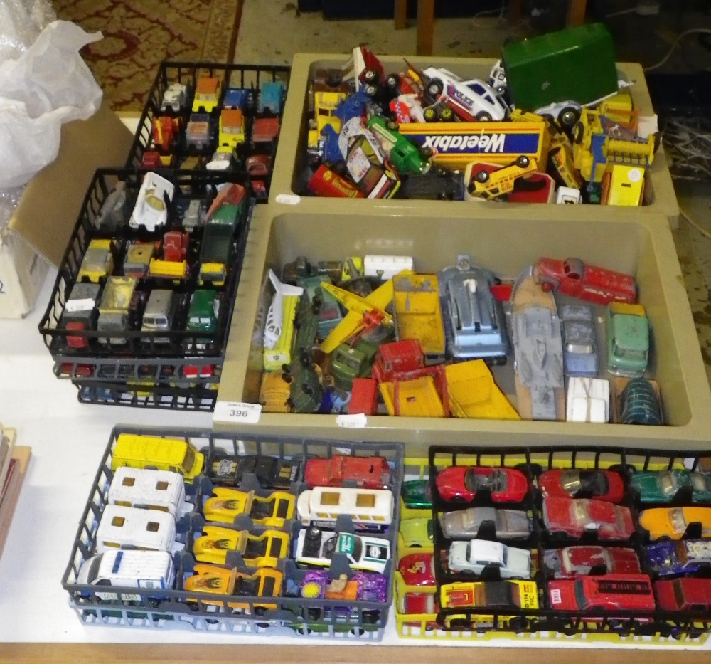 A large collection of assorted Dinky and similar toy cars including the Spectrum Pursuit Vehicle and