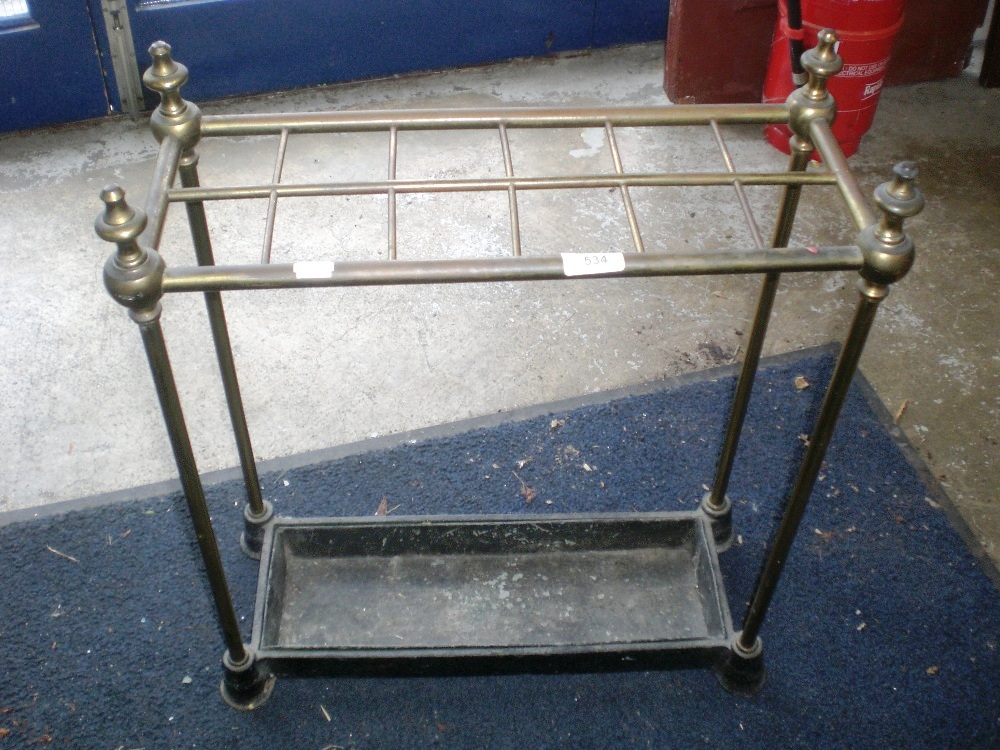A Victorian brass and cast-iron stick-stand