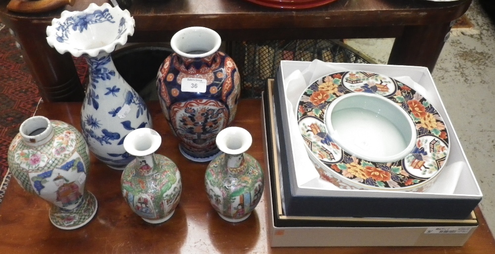 A pair of Chinese famille verte vases, a collection of similar Oriental ceramics including two