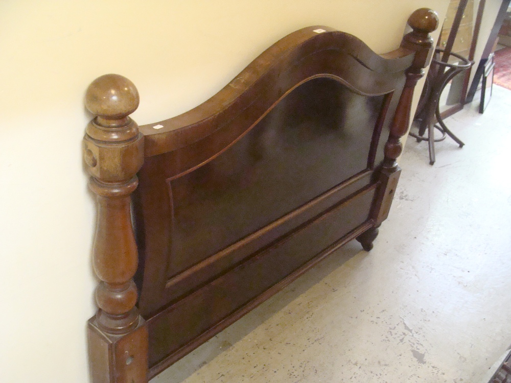 A Victorian mahogany double bedstead footboard