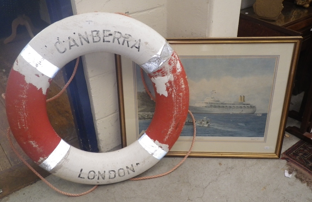 Ocean Liner Interest: A vintage life belt, inscribed `Canberra, London` and a signed limited