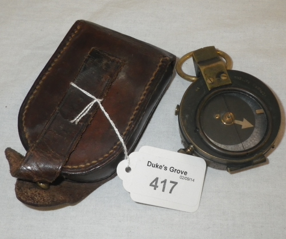A World War I Cruchon & Emons mother-of-pearl compass in a leather case