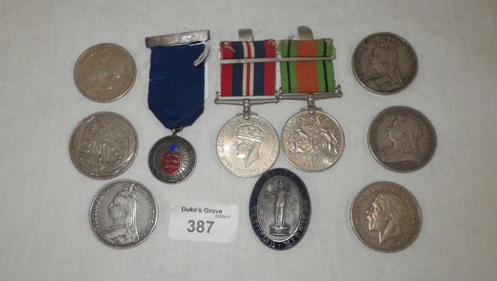 A quantity of Crowns, Medals and similar items