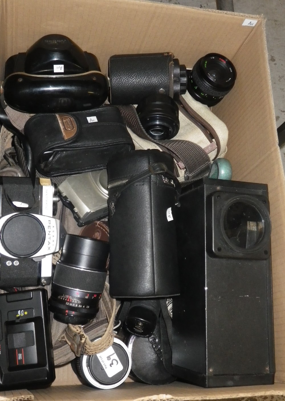 A collection of camera and home movie equipment