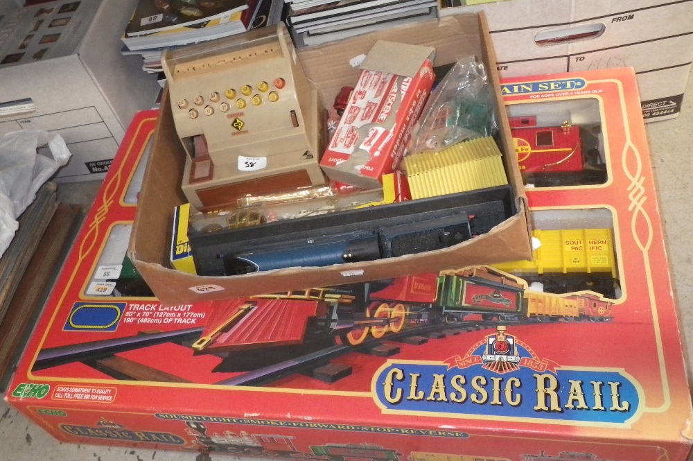 A battery operated G scale train set in box and a collection of similar toys