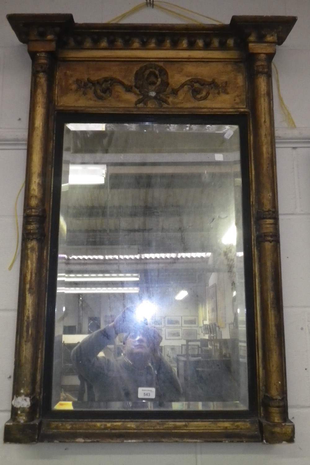 A Regency gilt framed pier glass with bevel edged mirror.