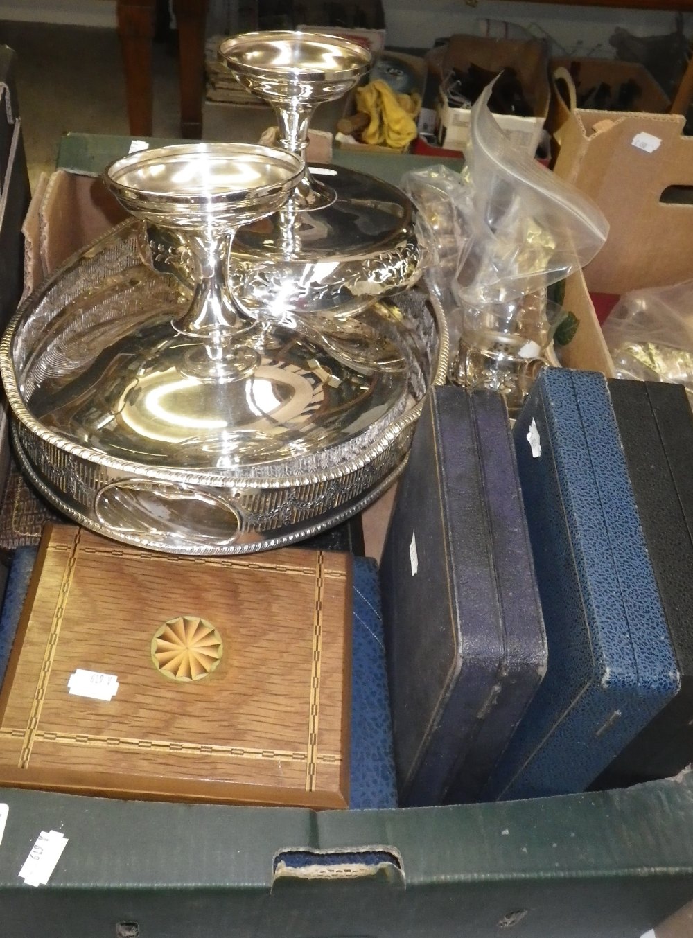 A quantity of assorted cased sets of cutlery, a plated tray and similar items.