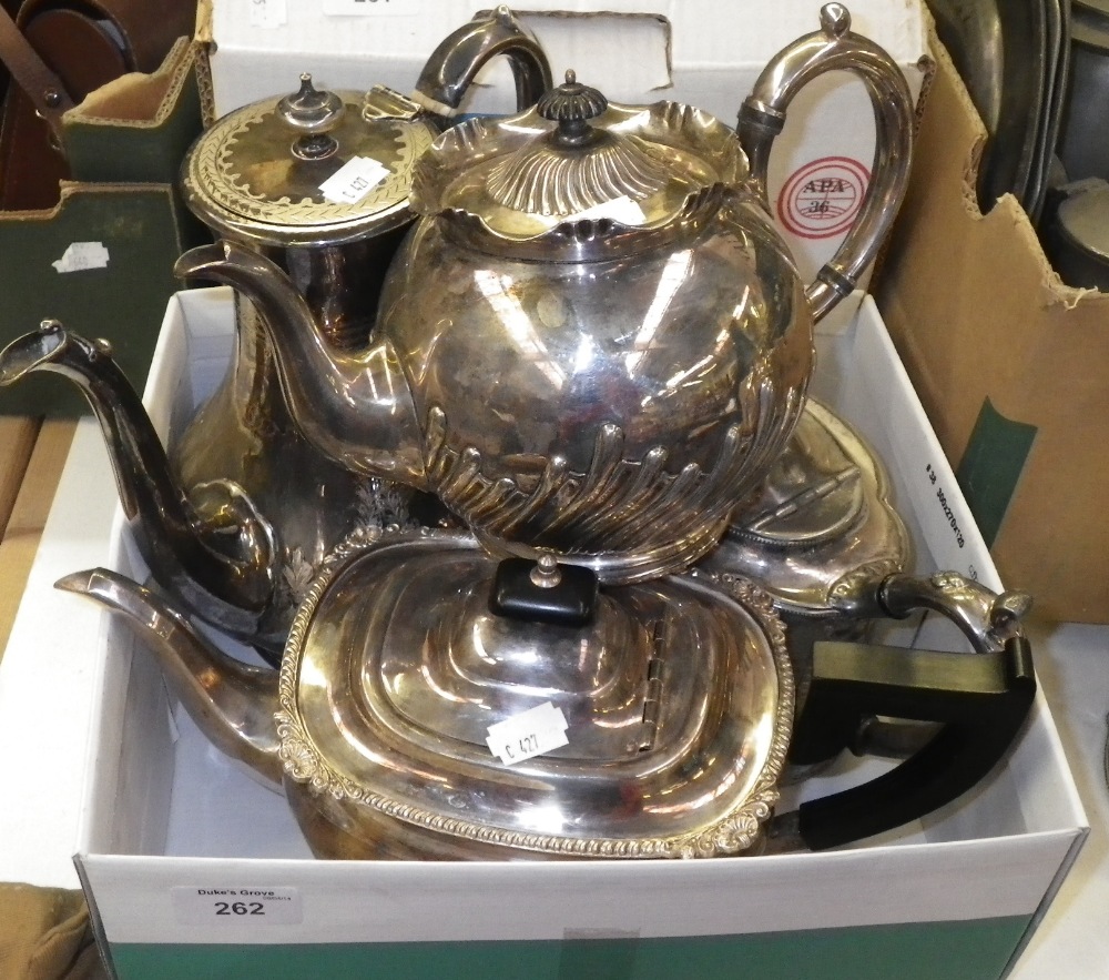 A quantity of assorted plated teapots.