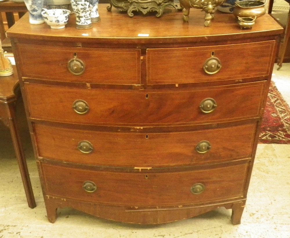 A 19th century bowfronted mahogany chest of drawers.