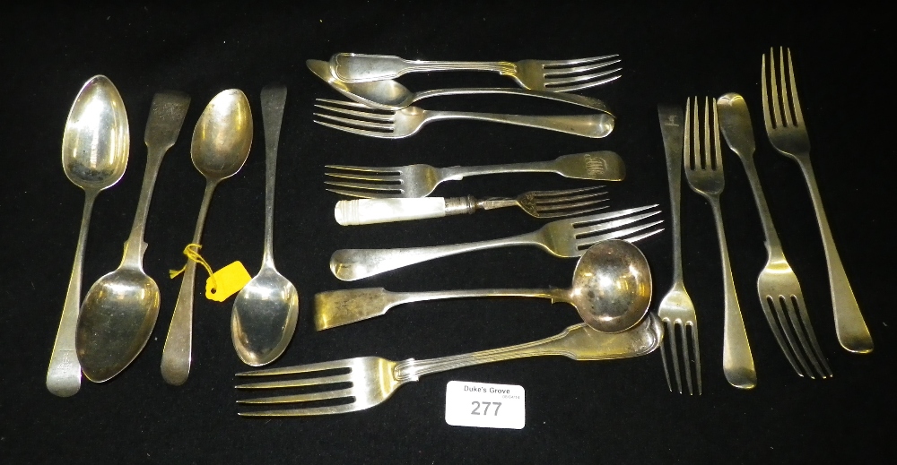 A quantity of various George III and later forks and spoons including ladles .