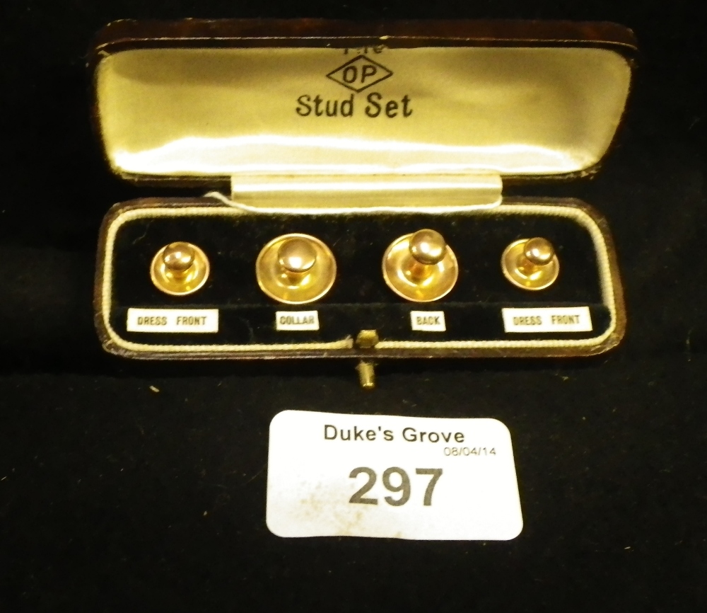 A cased set of 9ct yellow gold dress studs in a fitted case.