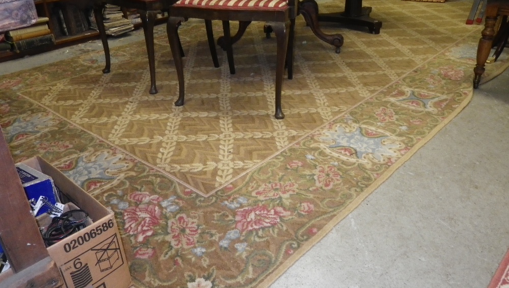 A Continental brown ground carpet with diaper central panel and floral border, 176" x 88" (plus