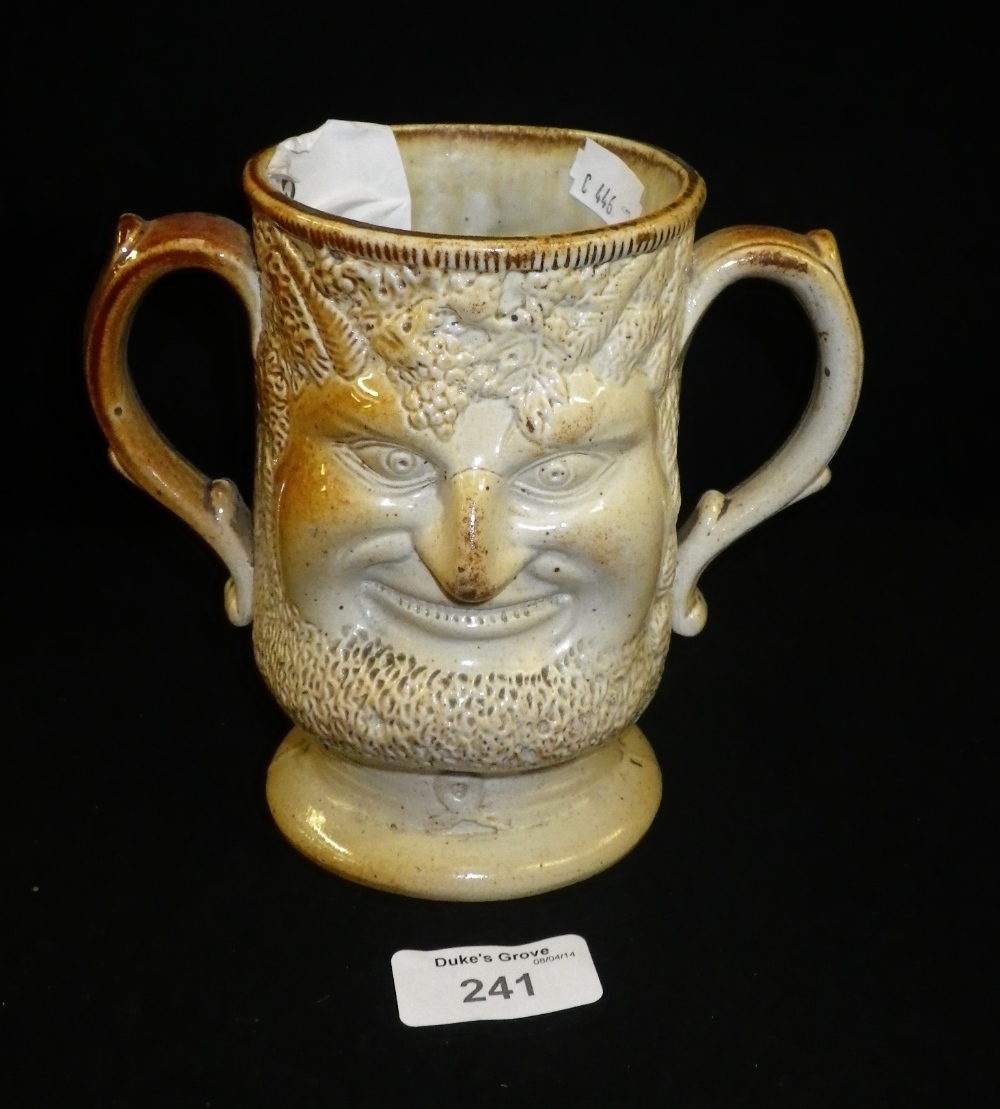 A stoneware double Bacchus mask loving cup.