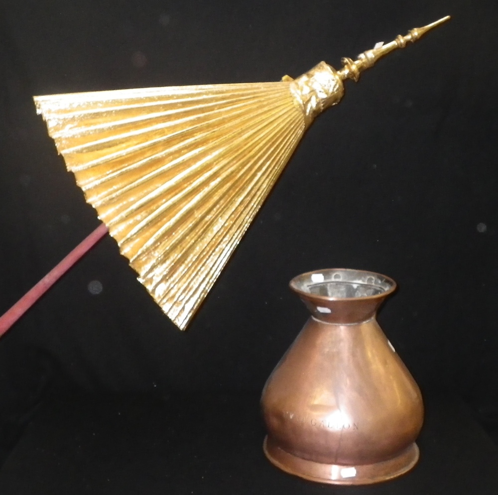 A 19th century copper sack measure, stamped `2 Gallon` and an Asian gilt parasol.