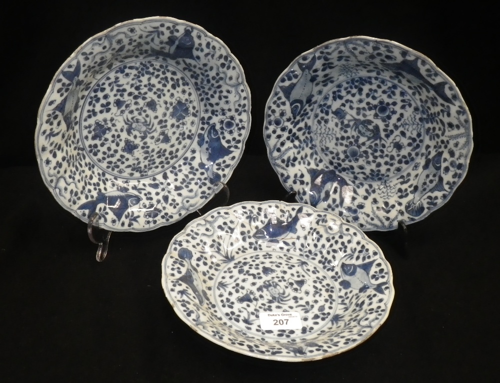 A set of three Chinese blue and white dishes.