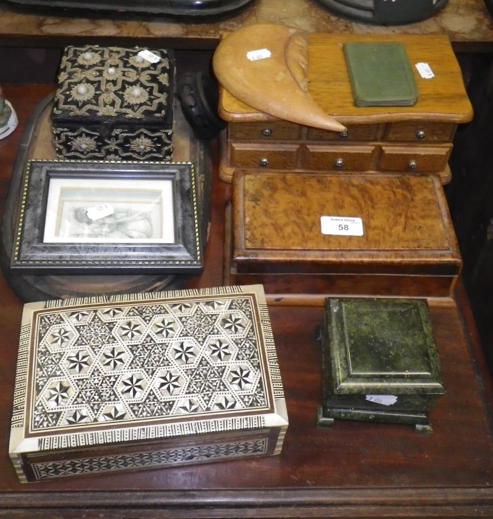 A collection of wooden boxes and sundries.