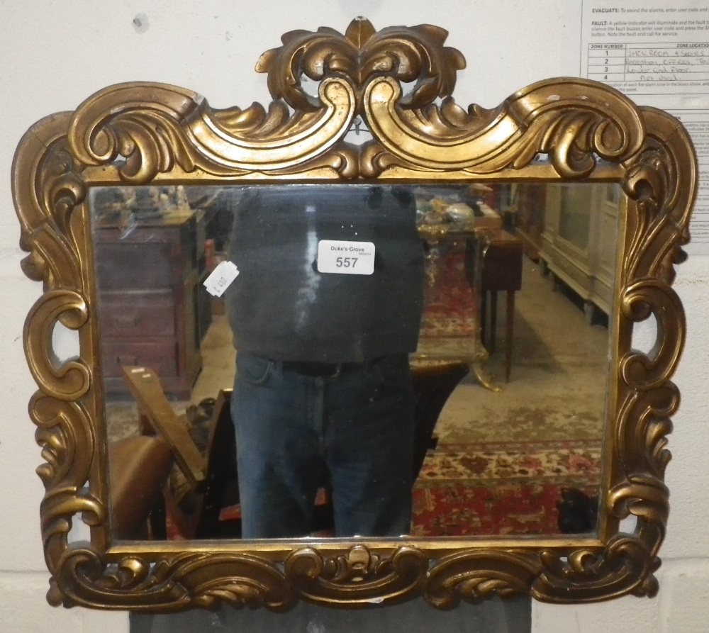 A rectangular gilt framed wall mirror.