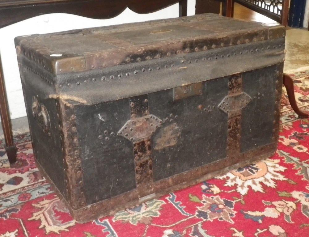 An early Victorian metal and brass bound trunk made by Maynard & Co, `Military and General Agents,