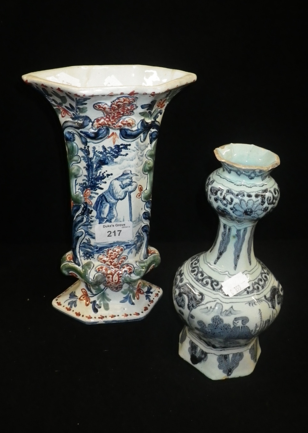 A Delft polychrome vase and another similar.