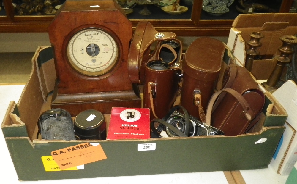 A quantity of assorted vintage cameras, an altitude meter and other items.