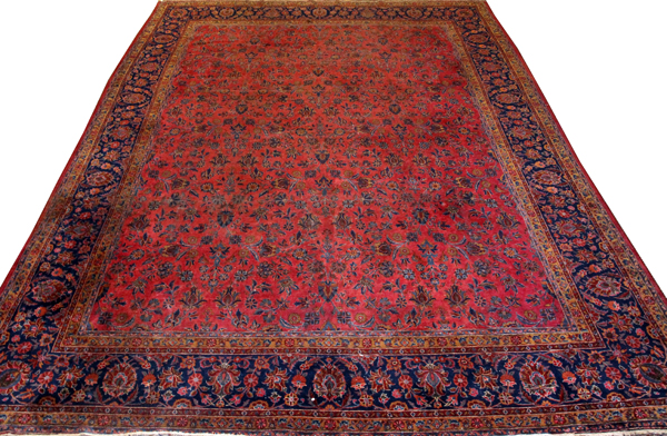 PERSIAN SAROUK WOOL HAND WOVEN CARPET, W 10` 6"", L 13` 9"": Red ground; overall spray design; c.