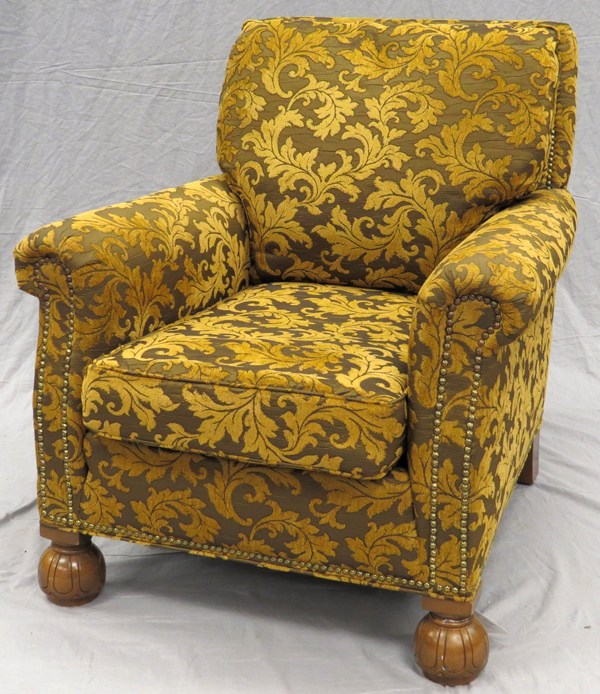 UPHOLSTERED DESIGNER ARMCHAIR, H 35", L 32": Nail head trim on arms and back. Round wood footed