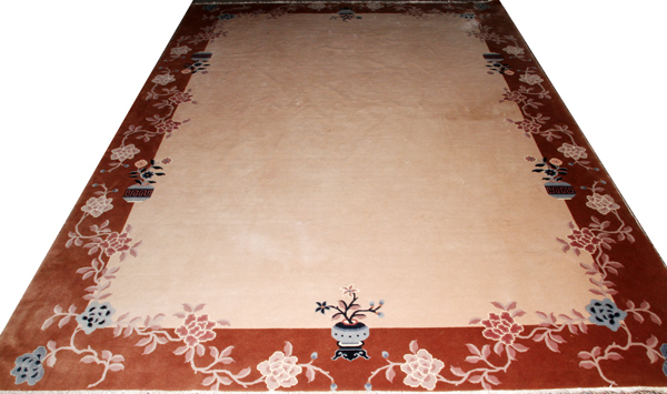 CHINESE HANDMADE WOOL CARPET, W 8` 7" L 11` 10": Open tan field; floral wide border; 90 line.