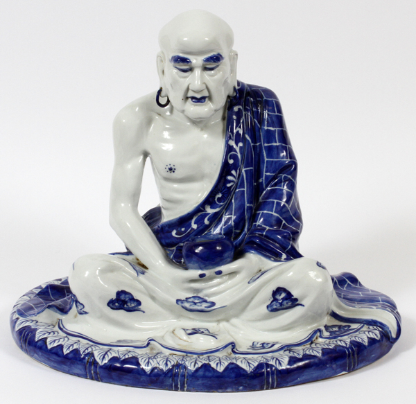 PORCELAIN ORIENTAL FIGURE OF A PRIEST/LOHAN, H 13 1/2":  Seated male praying.