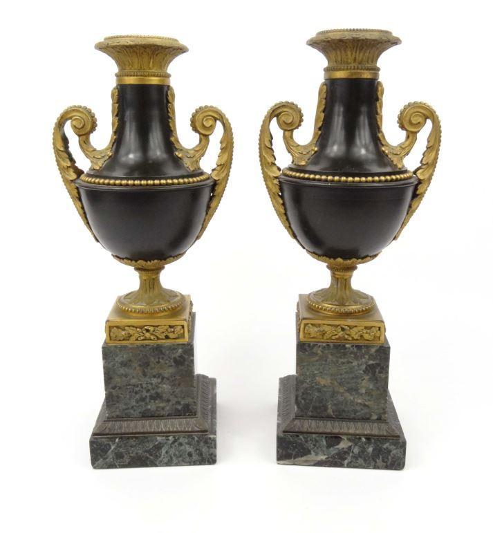 Pair of large green marble gilt metal urns, decorated with swags and bows, 37cm high : FOR
