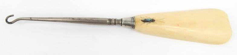 Ivory buttonhook/shoehorn with mother of pearl shibayama style insect and silver collar, London