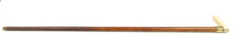 Ivory handled walking cane with gilt metal collar, 92cm in length : FOR CONDITION REPORTS AND LIVE