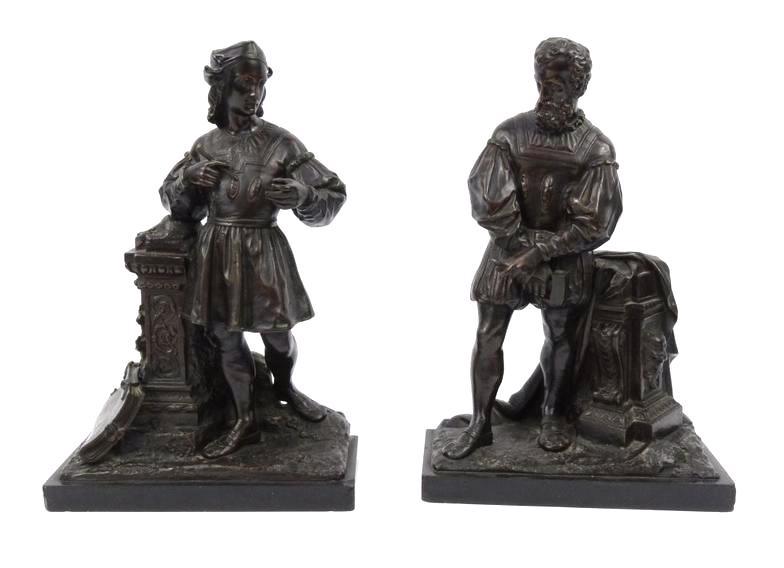 Large pair of well detailed classical bronzes of Michelangelo and Raphael on black marble bases,