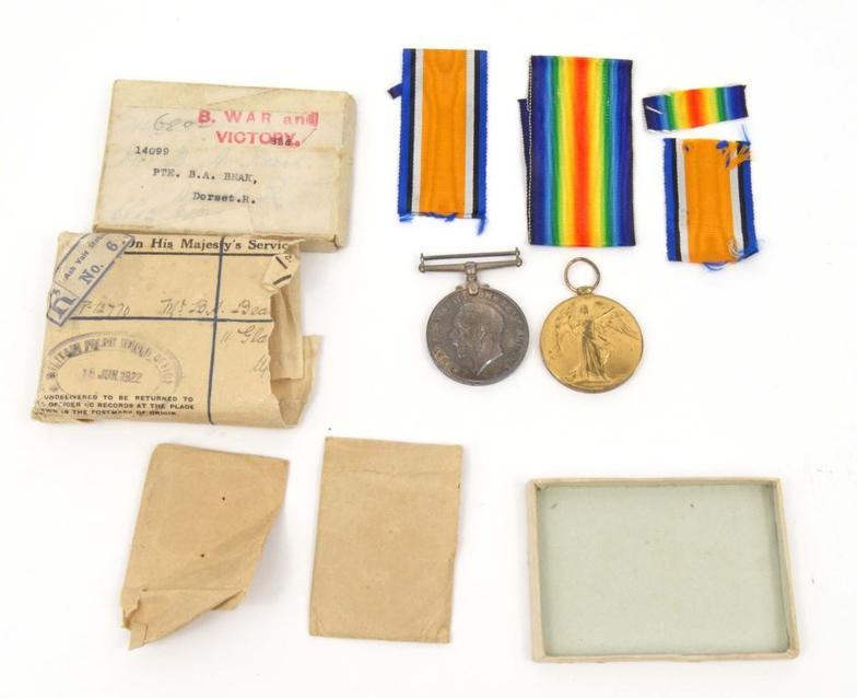 Boxed World War I War medal for PTE.B.A.BECK.DORSET.R. together with a Victory medal : FOR