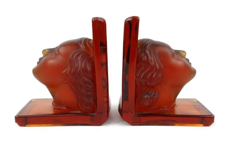 Pair of Art Deco amber frosted glass bookends with maidens` heads, 13cm high : FOR CONDITION