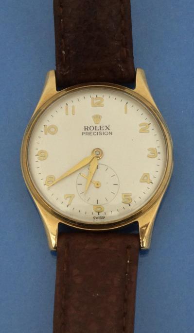 Gentleman` Rolex precision 9ct gold wristwatch with brown leather strap, approximate weight 31.3g :