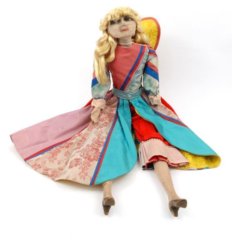 Continental cloth boudoir doll with composite legs and hands, wearing a floral silk dress and