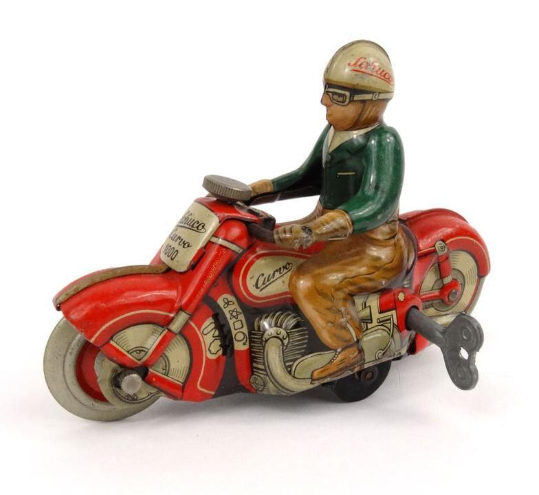 Schuco Curvo 1000 tinplate trick motorcycle rider, 9cm high : FOR CONDITION REPORTS AND LIVE