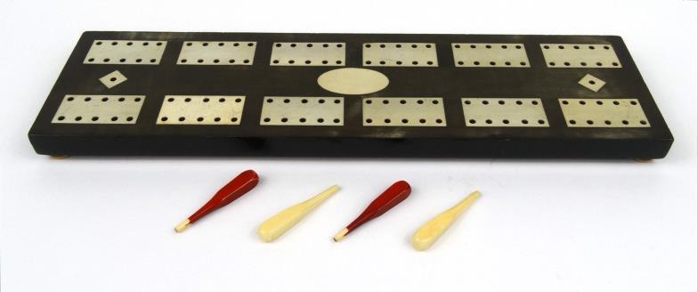 Large mahogany cribbage board with inlaid ivorine panels, the base compartment bearing stamp `