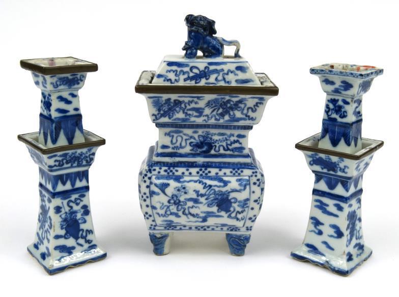 Chinese porcelain vase and cover and pair of square based candlesticks, each with metal mounts to
