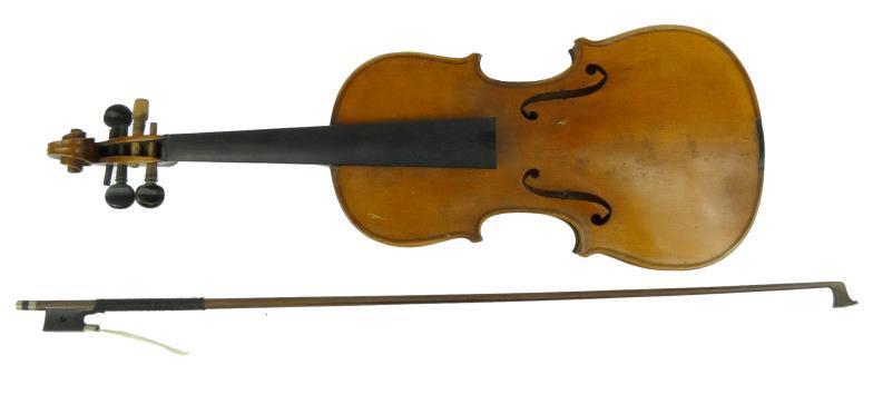 Old violin with two piece back and ebonised wood fittings, bearing label to the interior printed `