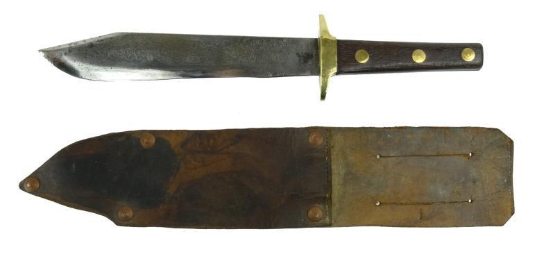 Bowie knife, the steel blade engraved with script `The Patriot`s Self Defender`, with brass hilt,