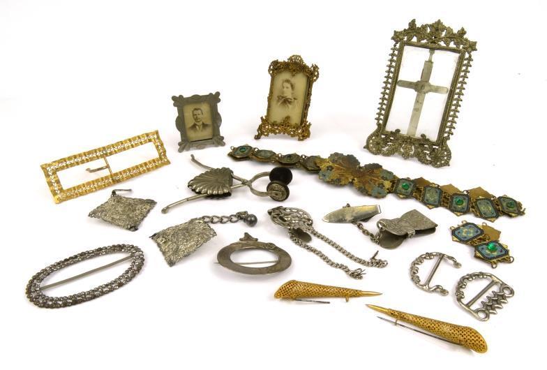 Large collection of Victorian and later belt buckles, brooches, skirt lifter, photo frame, etc :