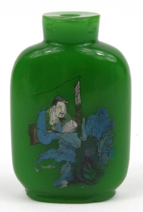 Chinese green snuff bottle decorated with a view of a figure with flowers to the reverse, 6.5cm