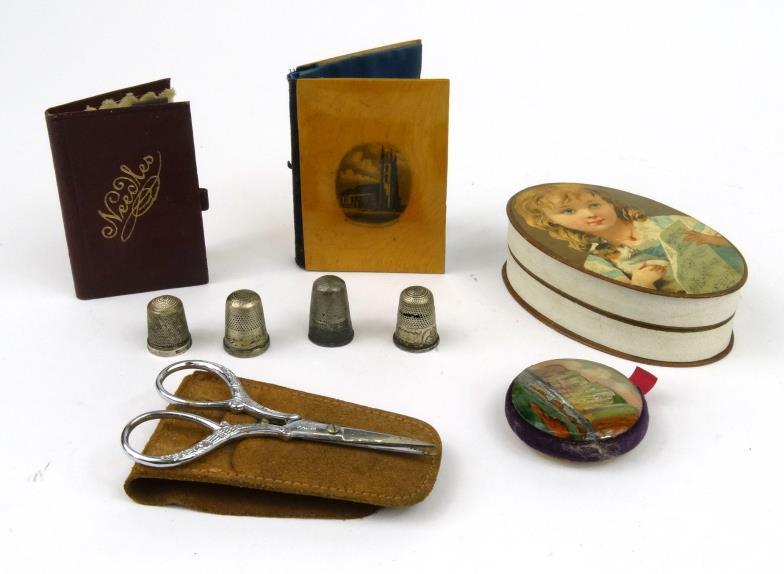 Objects including a Mauchlin ware needlecase decorated with a view of St John`s Church, Cardiff, a
