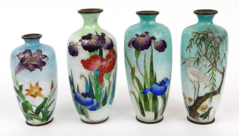 Four Japanese cloisonné vases enamelled with flowers and a crane onto graduated blue, green and