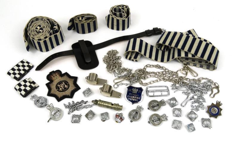 Collection of predominantly British Police ephemera including Metropolitan badges and whistles,