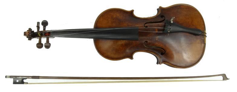Old Czechoslovakian violin with two piece back and ebonised wood fittings, bearing label to the
