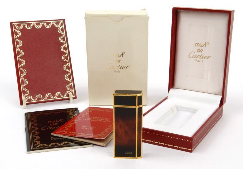 Boxed and cased Cartier Briquet lighter, numbered 35412T : For condition reports, please visit www.