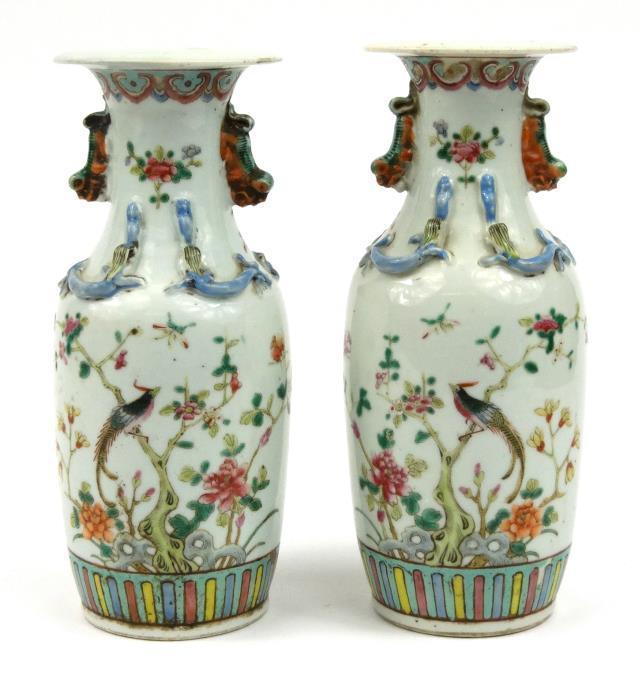 Pair of Chinese porcelain vases moulded with animals to the neck, each enamelled in the famille