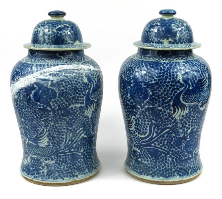 Pair of large Chinese porcelain baluster shaped jars and covers, underglaze blue painted with birds